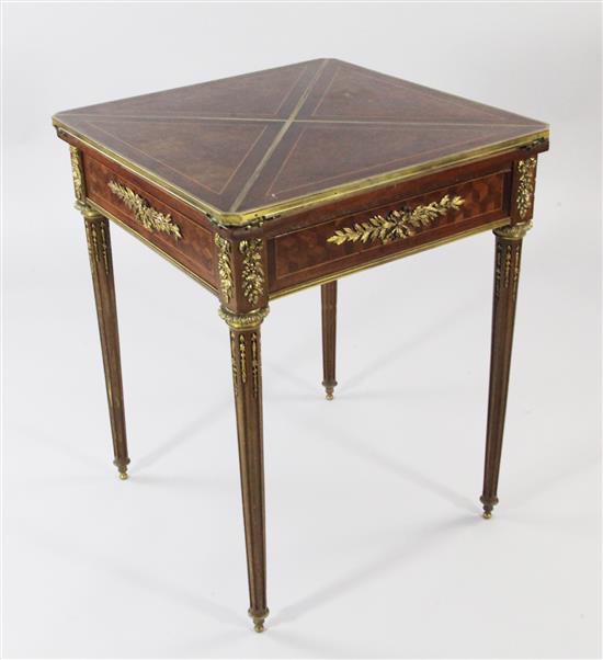 A Louis XVI style parquetry and ormolu envelope card table or table mouchoir, in the manner of Paul Sormani, W.1ft 11.5in.